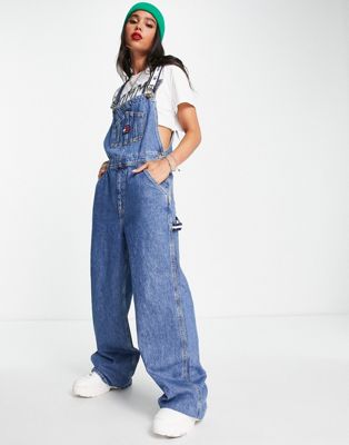 Tommy Jeans x ASOS exclusive baggy fit dungarees in mid wash