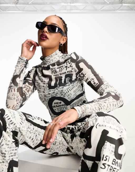 Tommy Jeans x Keith Haring unisex co-ord exhibit poster mesh long sleeve top in multi