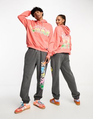 Tommy Jeans x Keith Haring unisex graphic print hoodie in coral