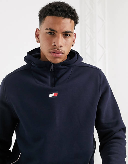 Tommy Sports central flag logo icon piping half zip hoodie in navy | ASOS