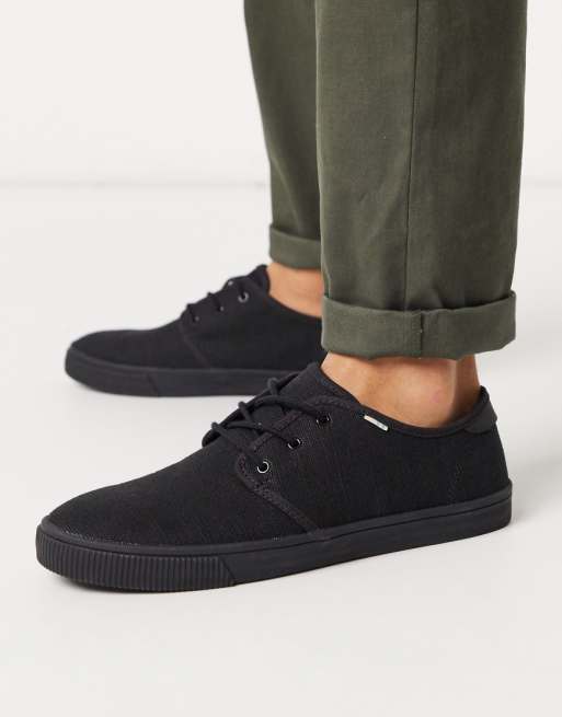 TOMS lace up plimsolls in black canvas | ASOS