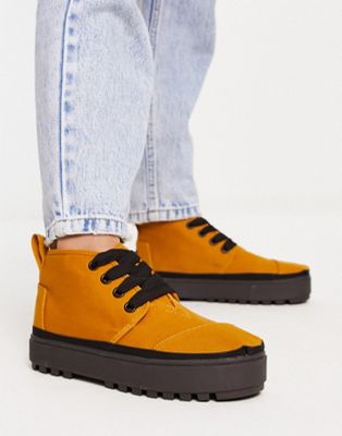 Toms lace up trainers in yellow