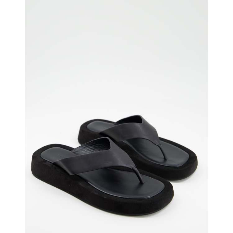 Tony Bianco Ives chunky flip flop sandals in black leather ASOS