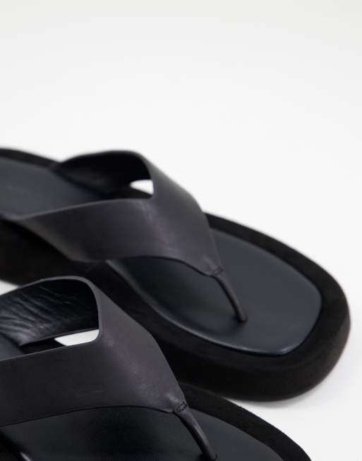 Tony Bianco Ives chunky flip flop sandals in black leather ASOS