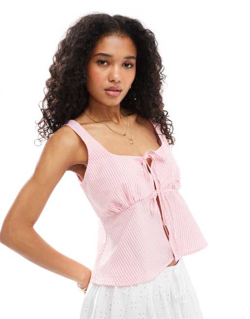 Top a rayas rosas con lazadas delanteras de tejido texturizado de ASOS DESIGN