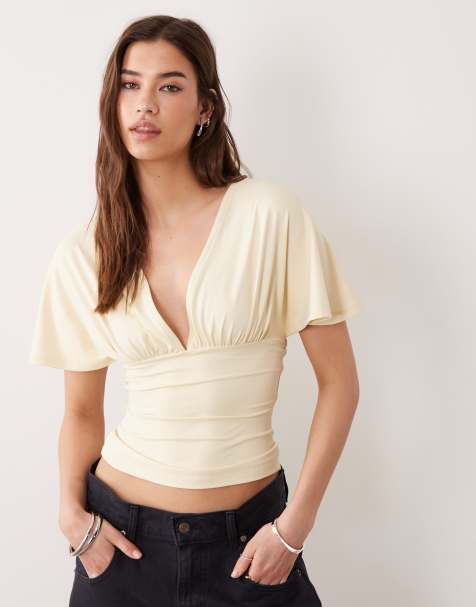 Top amarillo crema sin mangas con cintura entallada y lazada en la espalda de poliamida de ASOS DESIGN - view 1