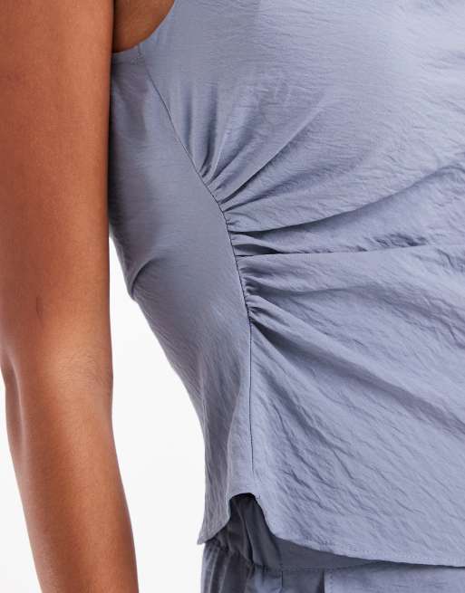 Top azul asimétrico con detalle retorcido de tejido texturizado de ASOS DESIGN (parte de un conjunto), 4 de 4