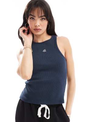 Top azul marino sin mangas con logo de canalé de 4th & Reckless