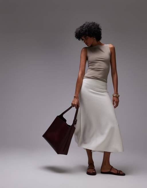 Top beis sin mangas de poliamida de Mango ASOS