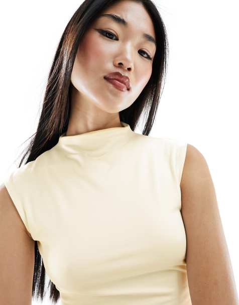 Top blanco ceñido sin mangas con hombros anchos, cuello alzado y diseño de dos capas de tejido suave de ASOS DESIGN - view 1