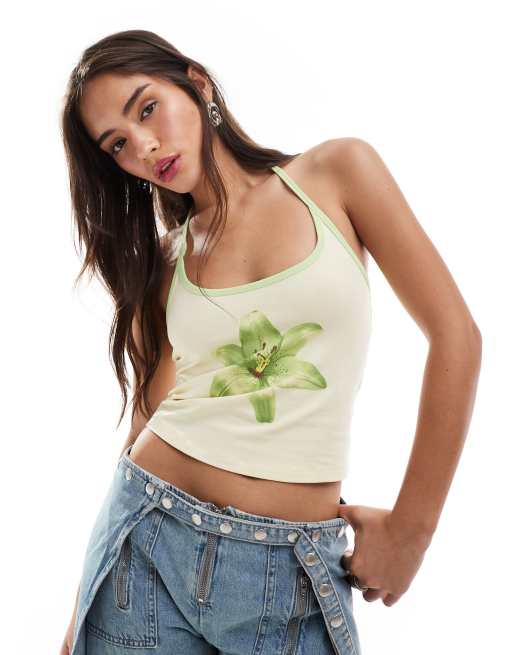 Top blanco con cuello halter y estampado de flor de Mango x Siedres