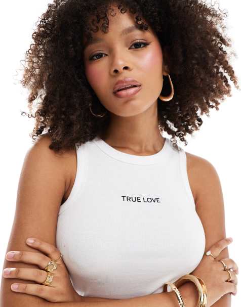 Top blanco sin mangas con texto "True Love" de PIECES - view 1