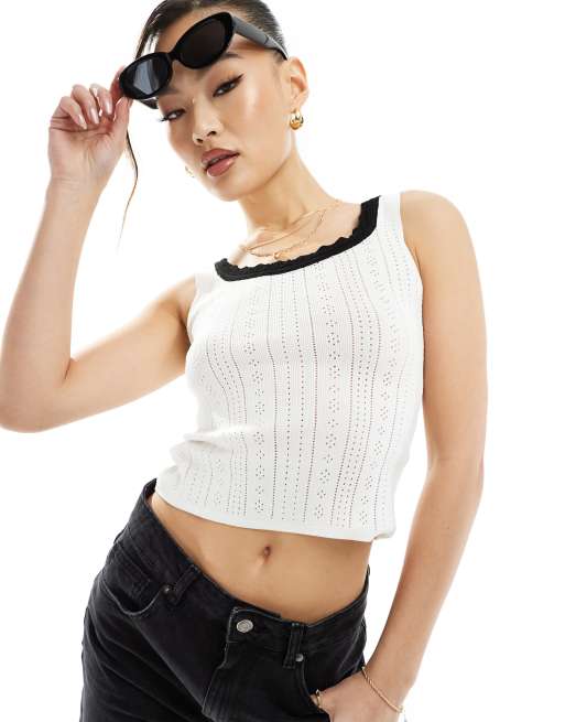 Top blanco sin mangas de pointelle con ribete de encaje en contraste de Fashionkilla
