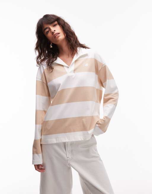 Top color arcilla desértica de manga larga y estilo rugby de New Balance