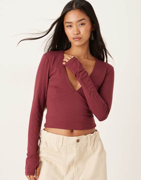 Top color ciruela de manga larga con cuello de pico de tejido suave de Gina Tricot - view 1