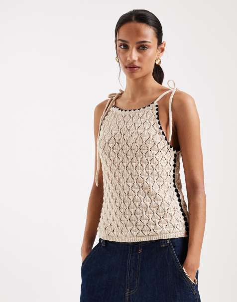 Top color crema de tirantes con cuello halter y ribetes negros en contraste de croché de AWARE - view 1