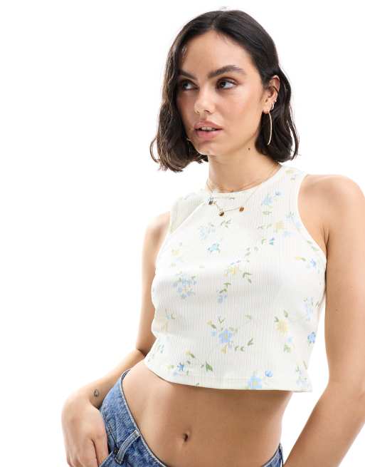 Top color crema sin mangas con estampado de florecitas de canalé de Pieces