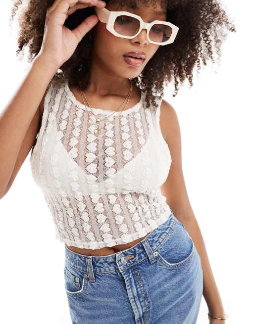 Top color crema transparente sin mangas con diseño de corazones de ONLY  