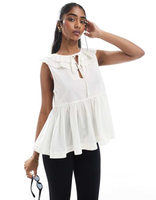Top color piedra sin mangas de corte amplio con solapas bordadas y lazada al cuello de ASOS DESIGN