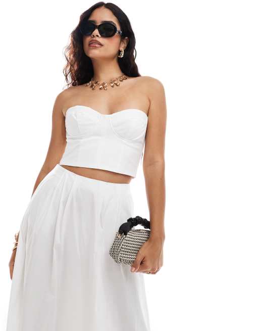 Top corsetero blanco con escote palabra de honor de Mango (parte de un conjunto)