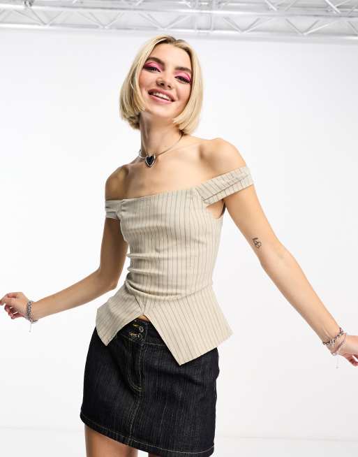 Top corsetero color crema con raya diplomática de COLLUSION 