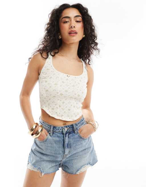 Top corsetero con estampado de florecitas y detalle de rosa de pointelle de Miss Selfridge