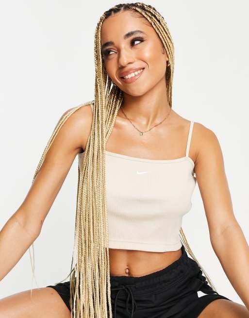 Top corto color arena basico con tirantes y logo pequeno de canale de Nike ASOS