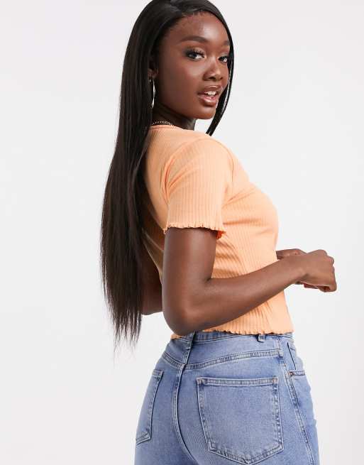 Top corto de canalé con parte delantera anudada en melocotón de Missguided, 2 de 4