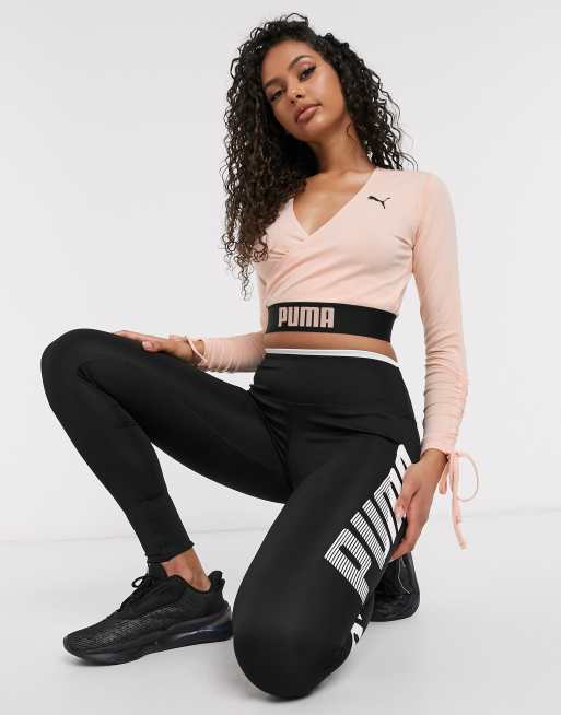 Top cruzado con detalle de lazo anudado en color melocot n exclusivo en ASOS de Puma Training