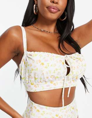Top de bikini de copas grandes tipo corsé con estampado de florecitas de ASOS DESIGN