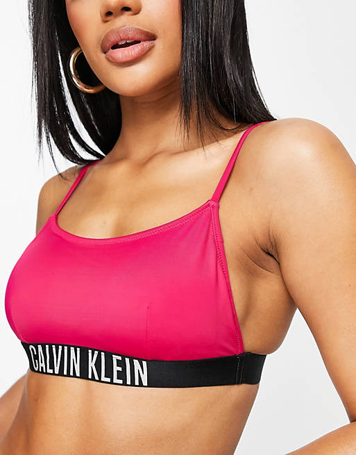Tradicional Generalmente hablando diario Top de bikini rosa estilo bralette con logo de Calvin Klein | ASOS