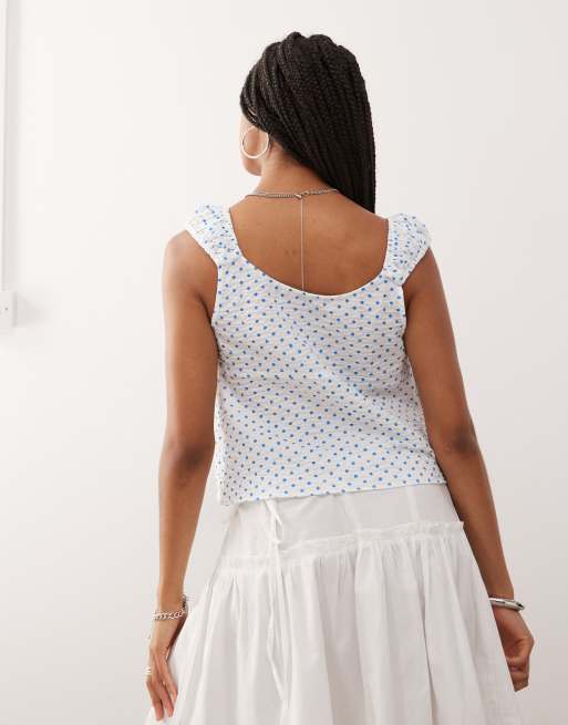 Top de estilo babydoll con estampado de lunares azules y lazada delantera de COLLUSION, 4 de 4