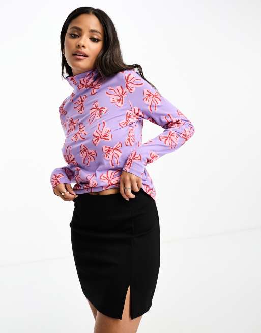 Top de manga larga con estampado de lazos y cuello alto de Monki