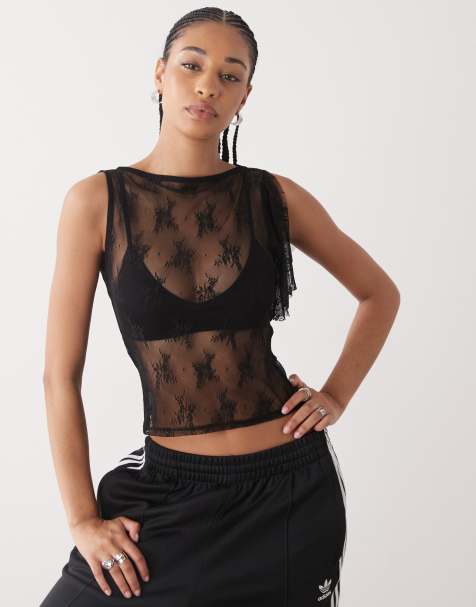 Top negro asimétrico con manga fluida de encaje de Asimétrico - view 1