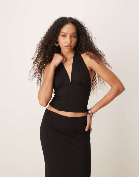 Top negro ceñido con cuello halter y espalda baja de tejido suave de Gina Tricot (parte de un conjunto) - view 1