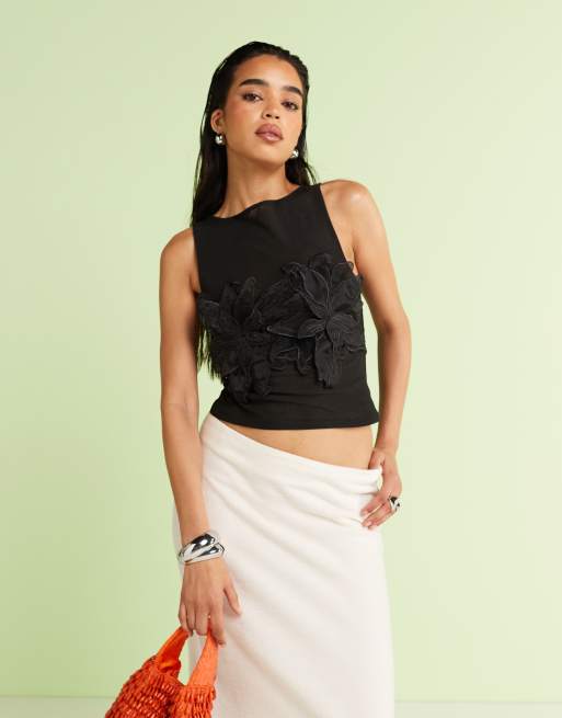 Top negro con aplicación floral de malla de ASOS DESIGN