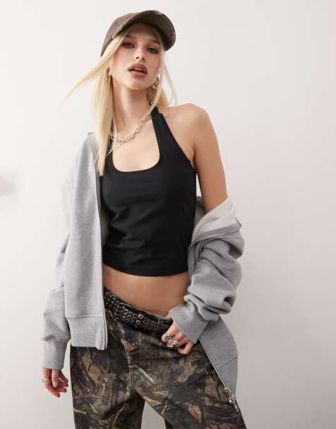 Top negro con cuello halter y detalle de ribetes de COLLUSION - view 1