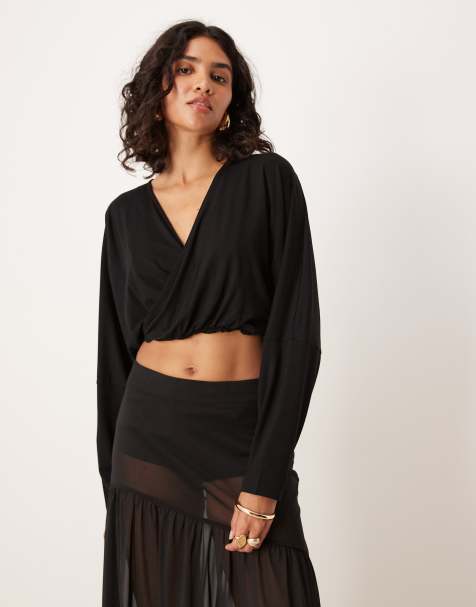 Top negro con diseño cruzado en la parte delantera y mangas murciélago largas de ASOS DESIGN - view 1