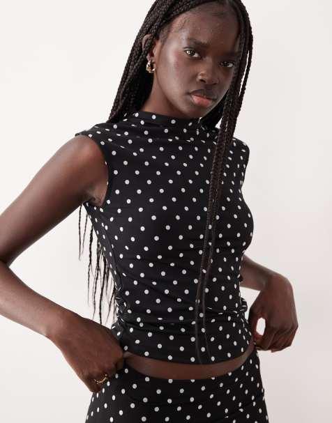 Top negro con estampado de lunares blancos y cuello alzado de Gina Tricot (parte de un conjunto) - view 1