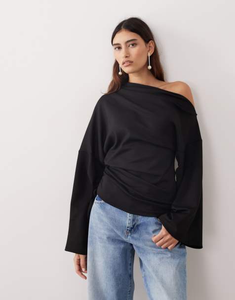 Top negro con hombro caído, mangas anchas y bajo fruncido de punto liso de ARRANGE - view 1