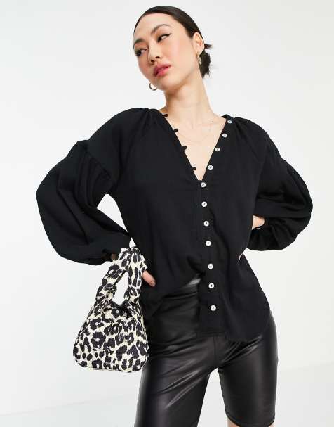 Top negro con mangas voluminosas y botones de concha de ASOS DESIGN - view 1