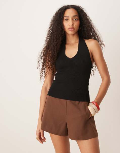Top negro de corte slim con cuello de pico de punto fino de Mango - view 1