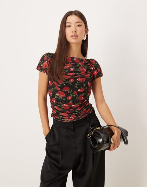 Top negro de manga corta abullonada con estampado de rosas rojas de malla de Gina Tricot - view 1