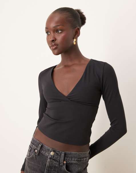 Top negro de manga larga con cuello de pico DayFlex de TALA - view 1