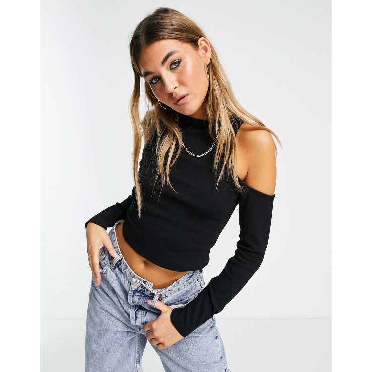 negro de manga larga con hombros descubiertos de DESIGN |