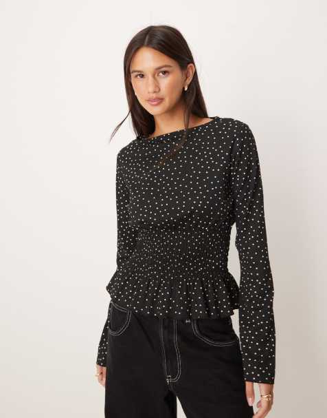 Top negro de manga larga con sobrefalda y estampado de lunares de Gina Tricot - view 1