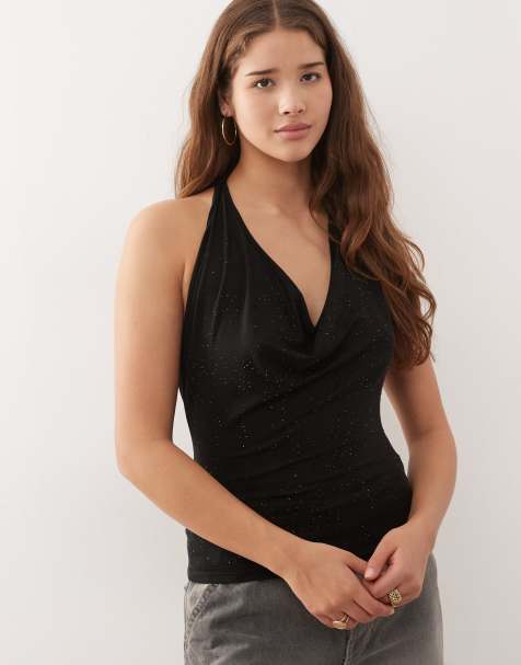 Top negro escotado con cuello halter y pedrería de Weekday - view 1