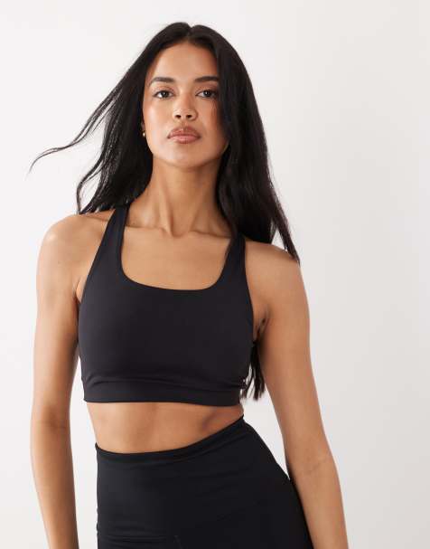 Top negro estilo sujetador deportivo con espalda cruzada para yoga Mix & Match de Gina Tricot - view 1