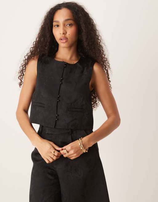 Top negro sin mangas de jacquard de Scalpers
