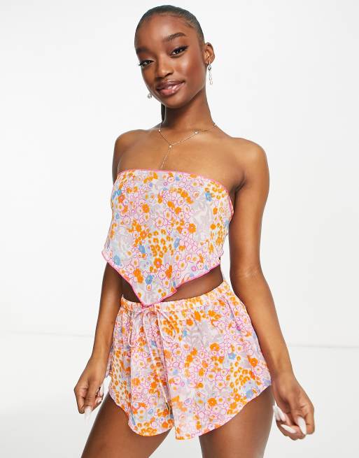 Top playero con bajo de pico y estampado de florecitas en tonos pastel de Candypants (parte de un conjunto) 